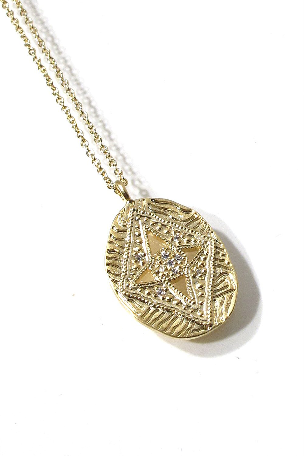 Louise Hendricks collier médaille Calypso