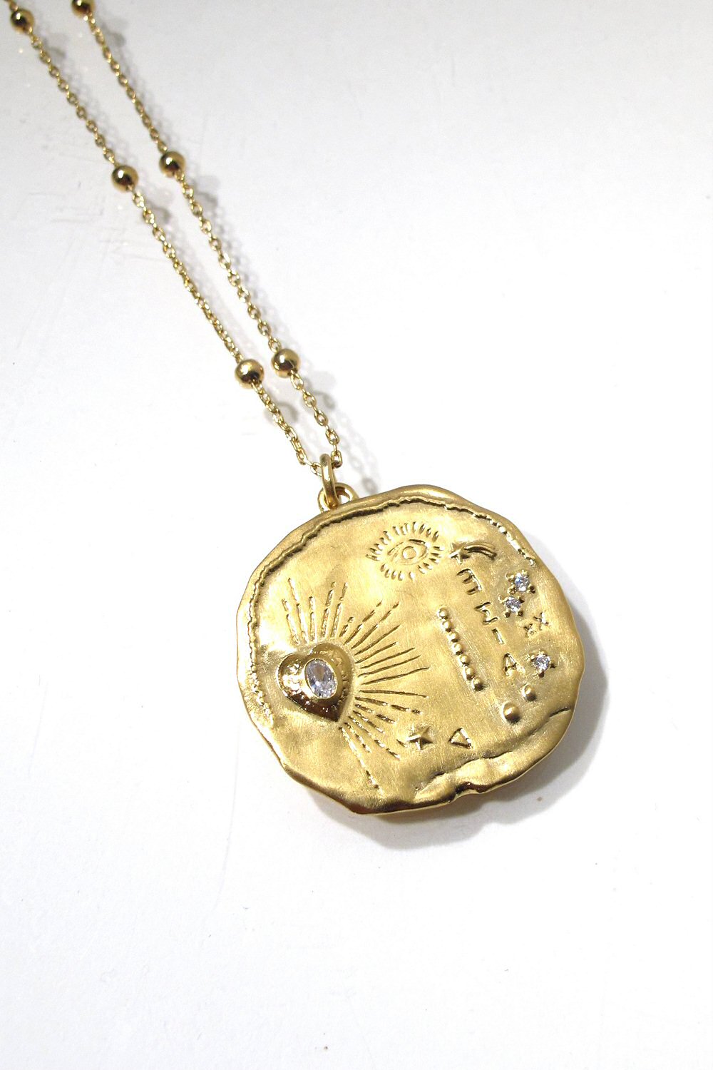 Louise Hendricks collier médaille Madame M