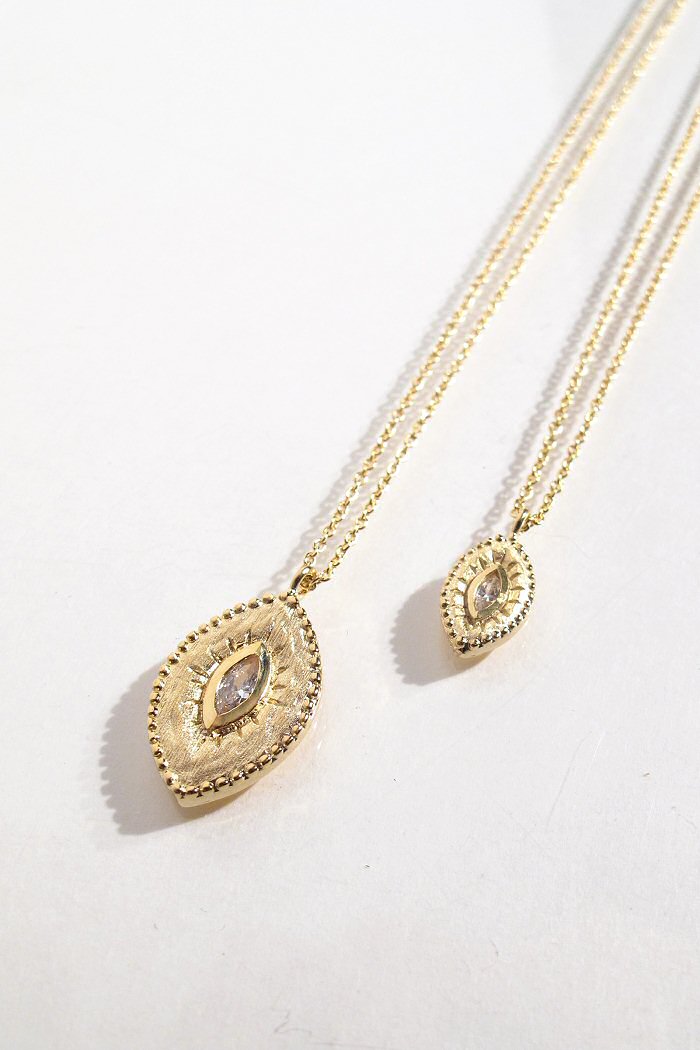 Louise Hendricks medal necklace Pilar good eye