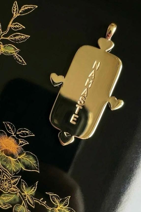 Flora Jane charm Namaste message