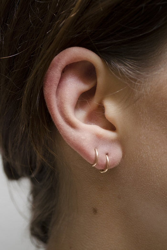 Sansoeurs Snake earring 18k gold twirl